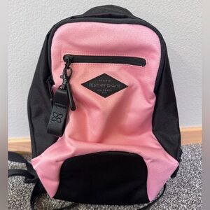 Sherpani mini backpack. Pink and Black. NWT